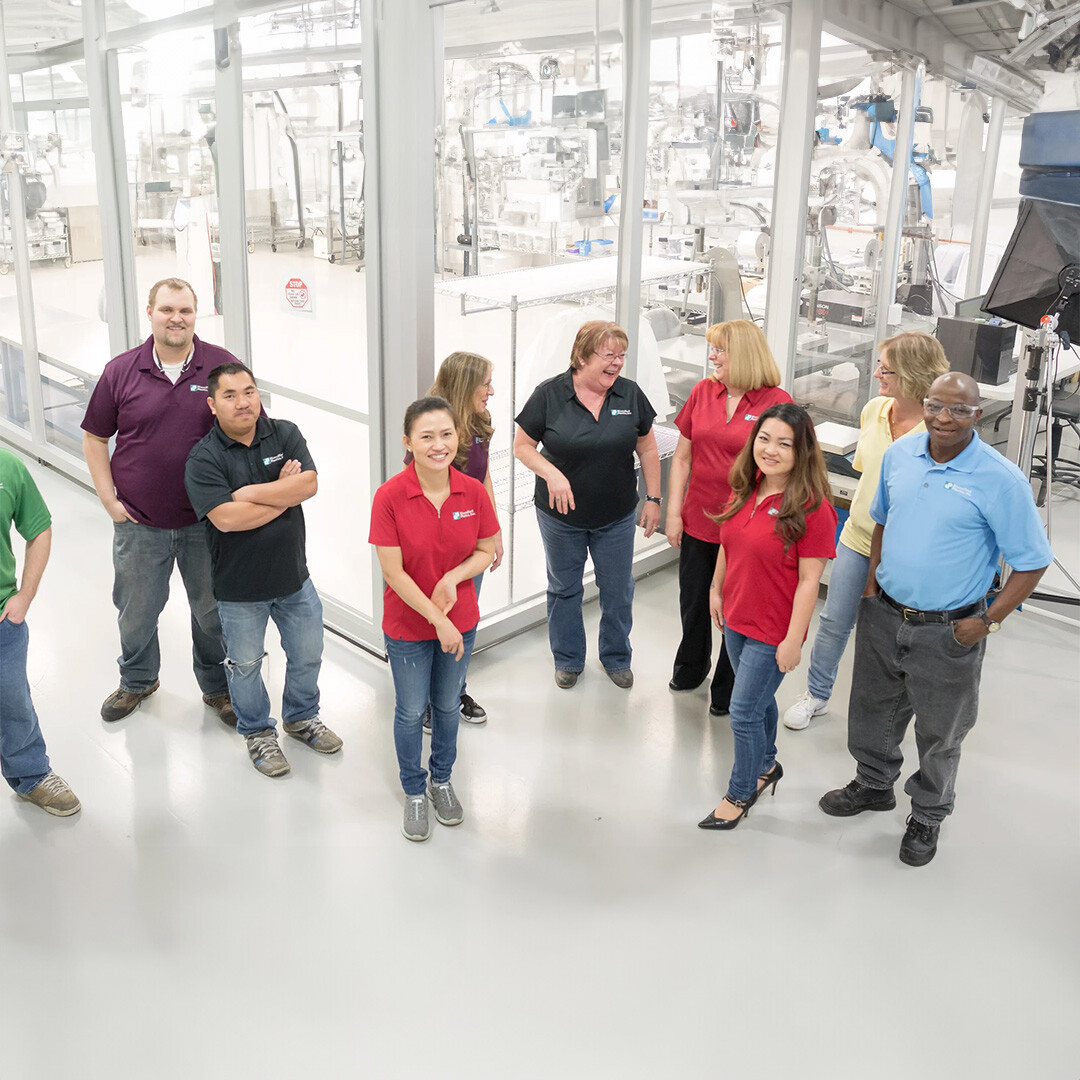 Employee owners taking a photo at Aprios in Brooklyn Park, Minnesota.